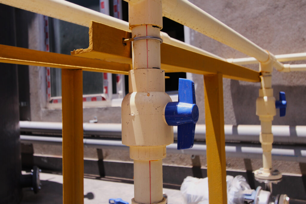 PVC valve and pipe connection close-up